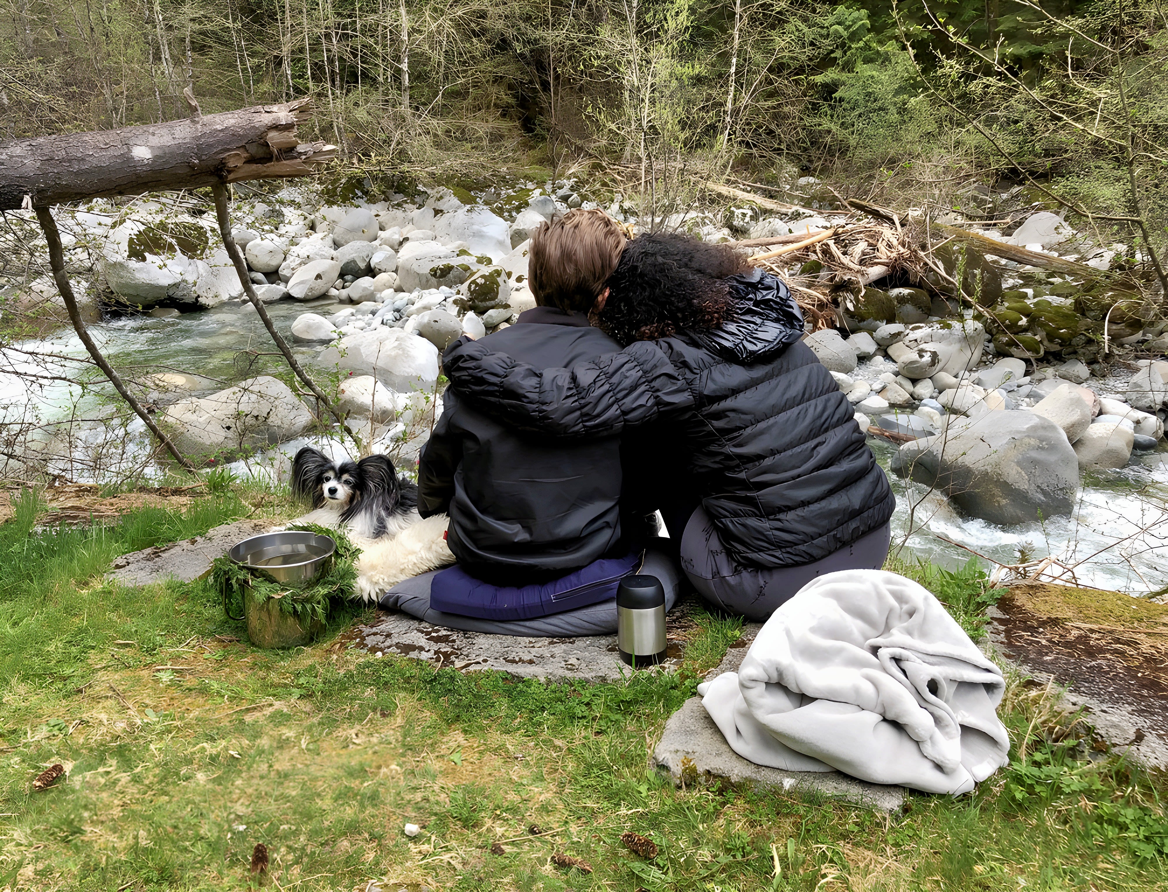 photo taken from behind of Donimo, Sarah and their dog, Jackson