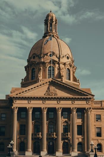 A large building with columns and a dome